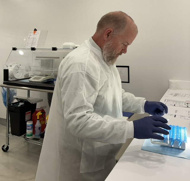 Drew Pyrz preparing hormone replacement suppositories at the Center Drugs compounding station